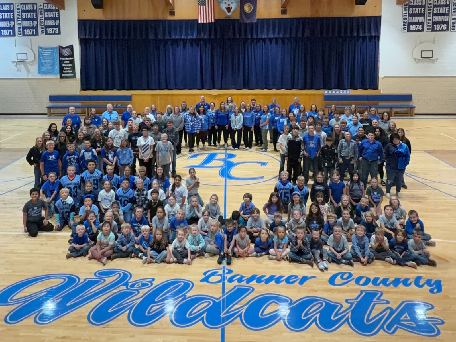 Students and staff posing for a picture